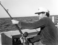 Photo of Fish Artist Randy McGovern deep sea fishing.